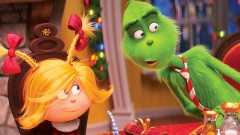 (from left) Cindy-Lou Who (Cameron Seely) helps liberate the Grinch (Benedict Cumberbatch) from his grumpiness in Dr. Seuss’ The Grinch from Illumination.